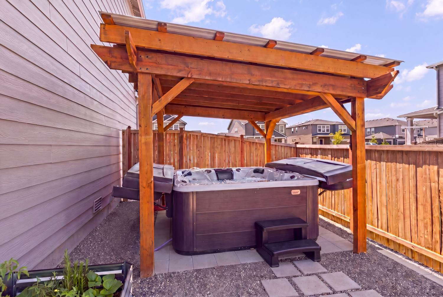 Jacuzzi under the custom-built 10x10 pergola