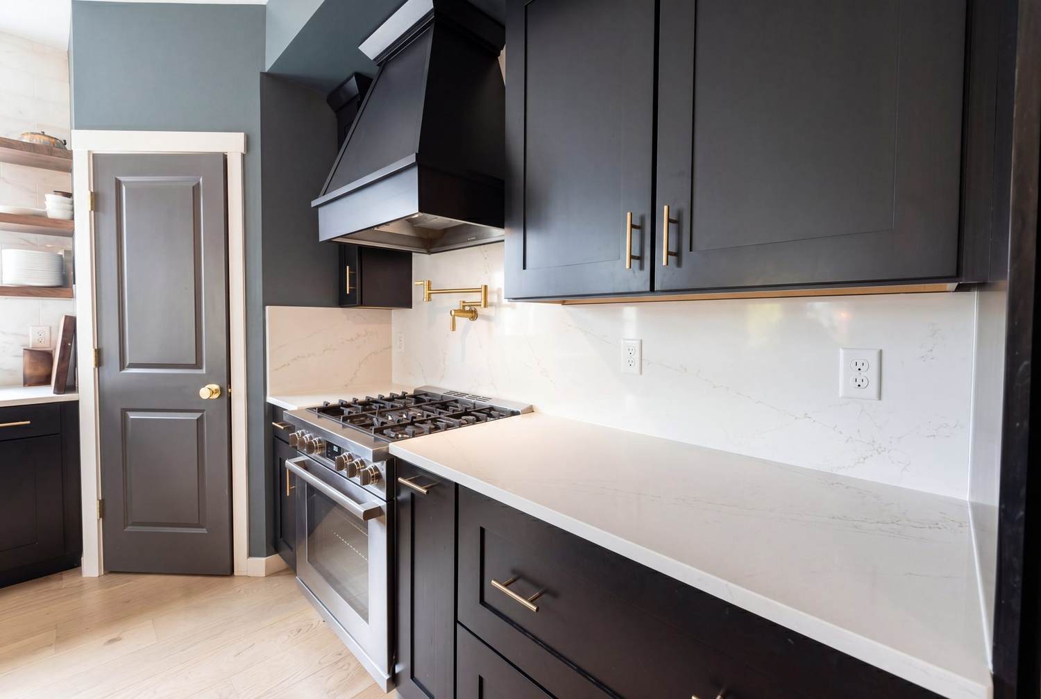 Custom Schuler cabinetry and range wall