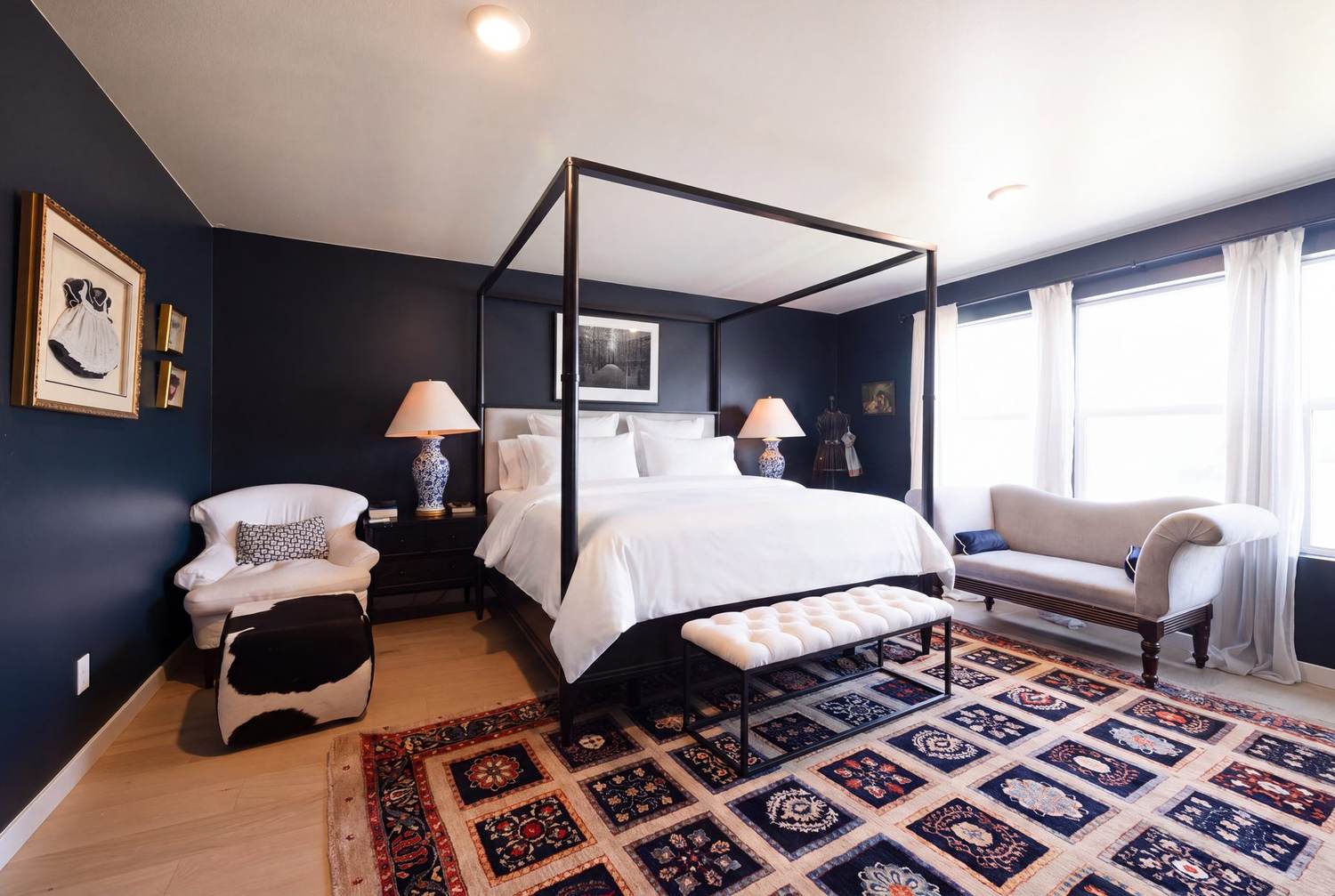 Primary bedroom with engineered hardwood