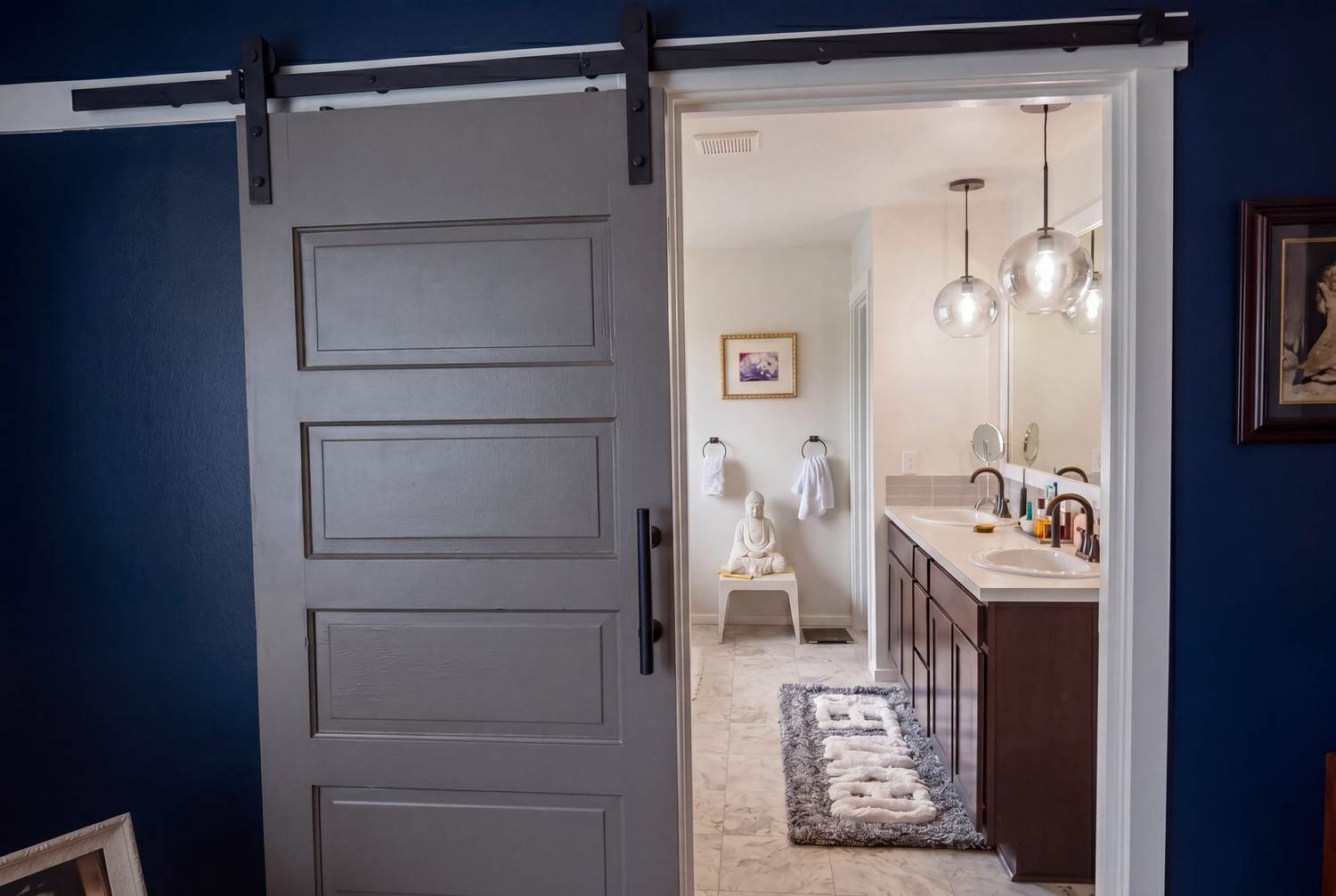 Sliding barn door into the primary bath