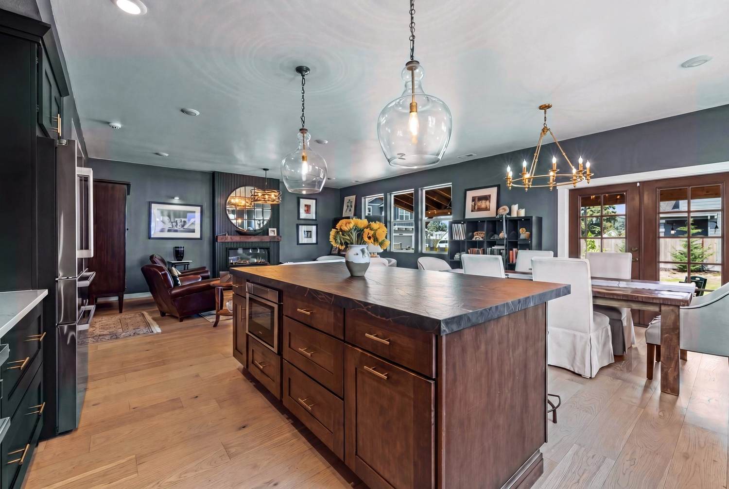 Open-concept kitchen, dining, and living sightline