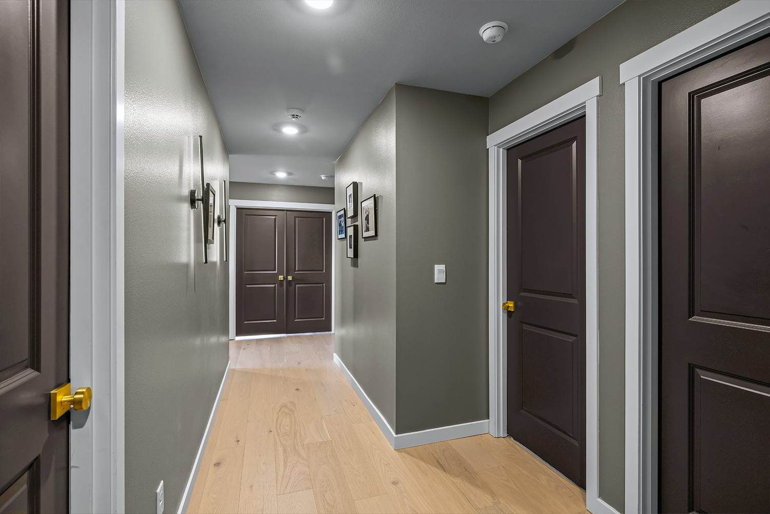 Upstairs hallway with hardwood landing
